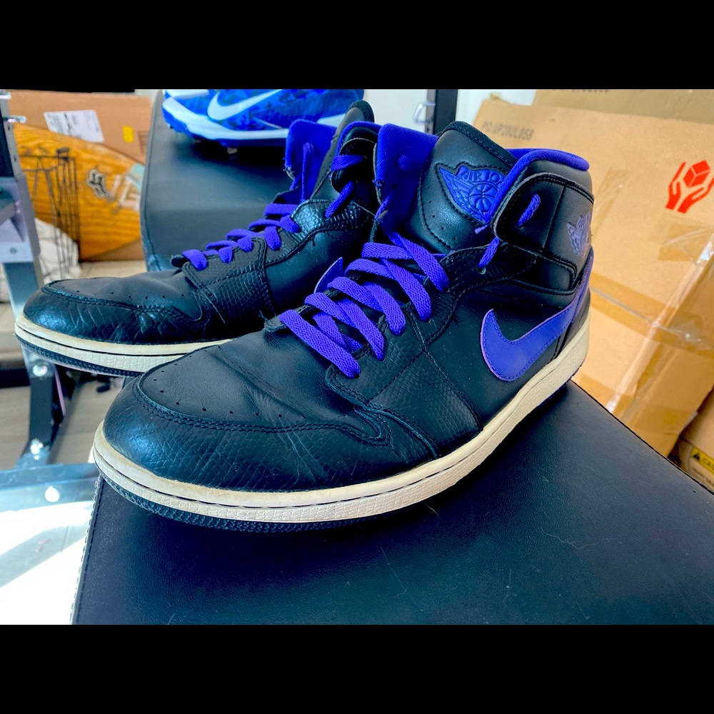 Black and purple air jordans